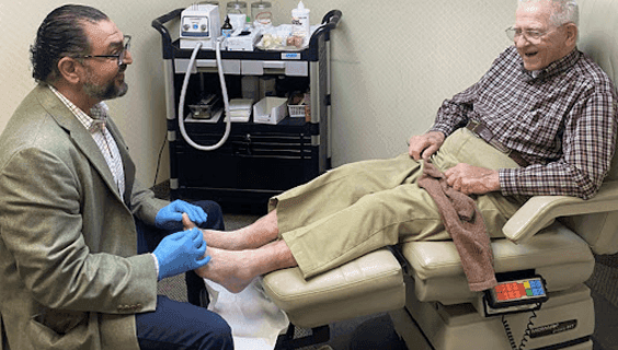 Podiatrist reviewing a personalized follow-up care plan with a patient